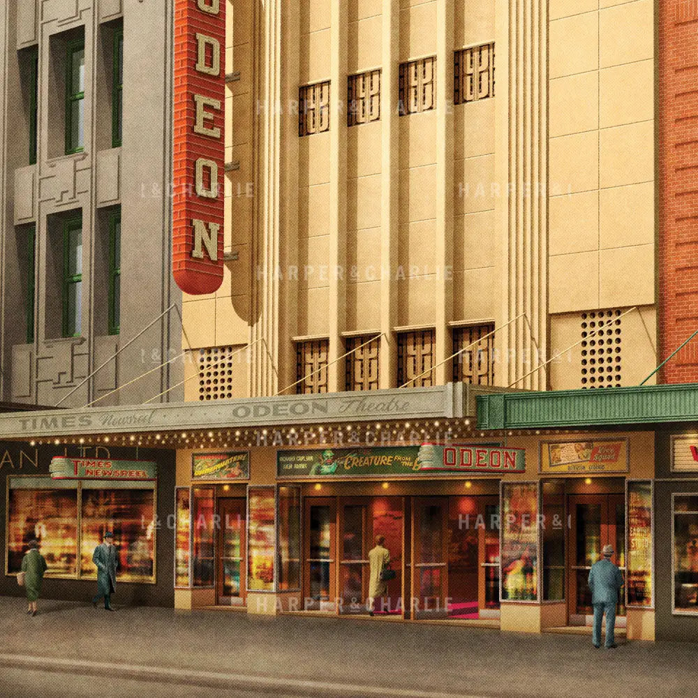 Close up view of the Art Deco-style Odeon Theater in Melnbourne with people walking by
